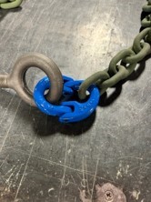Detachable link connects safety chain to water trailer eye bolt