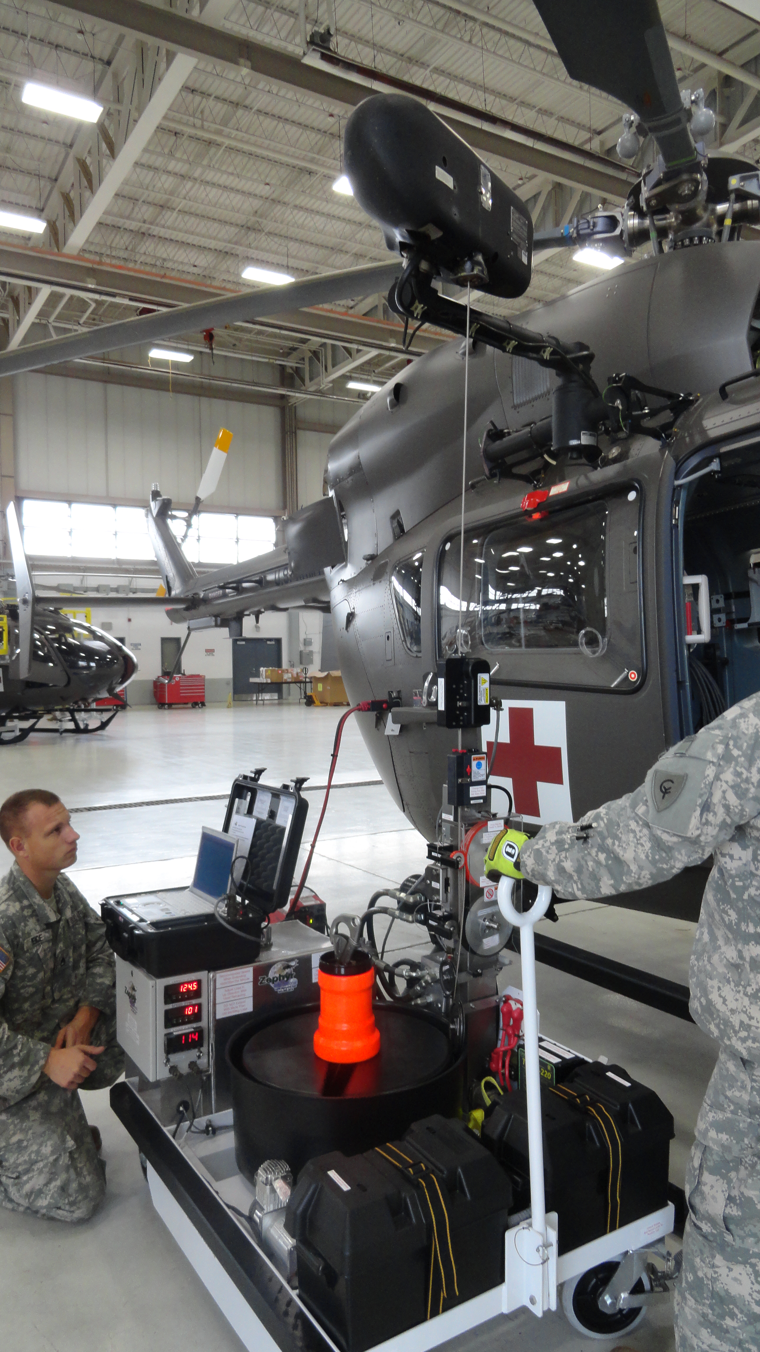 Soldiers working on Lakota helicopter with Zephyr.